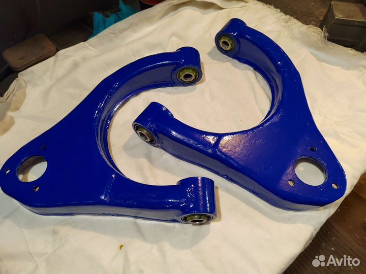 Верхние рычаги передней подвески Волга 31105