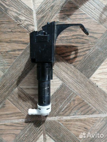 Форсунка омывателя левая Toyota Camry ACV40