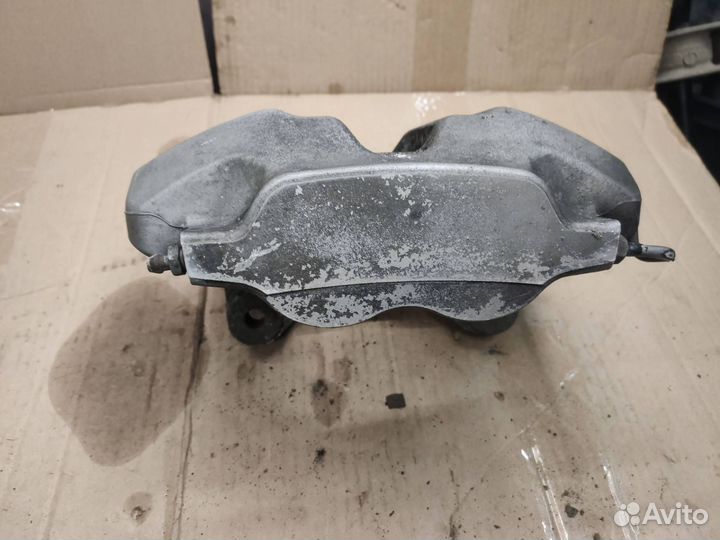 Суппорт тормозной передний левый BMW 7 G11/G12