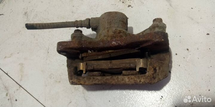 Суппорт тормозной задний правый Mitsubishi