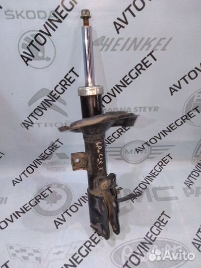 Стойка амортизатор Mitsubishi Lancer 10