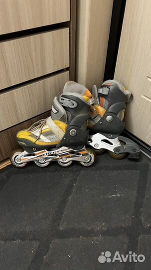 Роликовые коньки