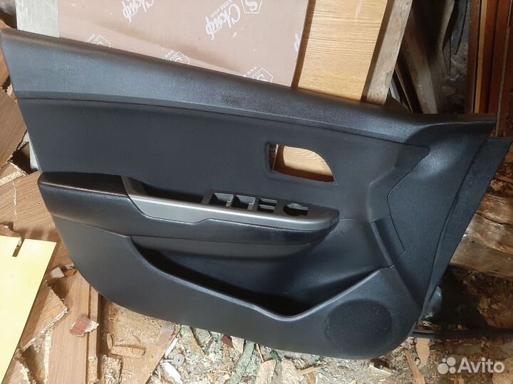 Обшивка (карта) дверей Kia Rio 3