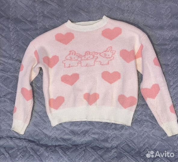 Розовый свитер