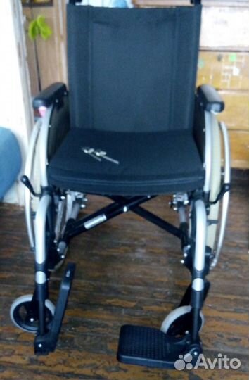 Инвалидная коляска