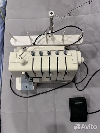 Коверлок merrylock