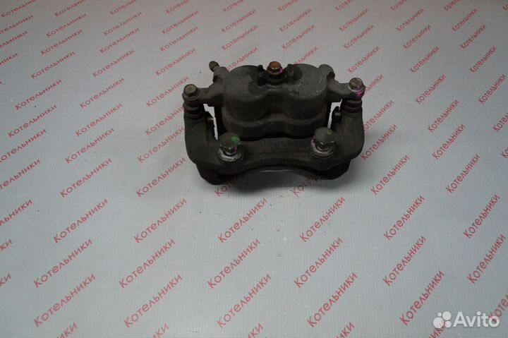 Nissan 41011-4N000 Суппорт тормозной передний L