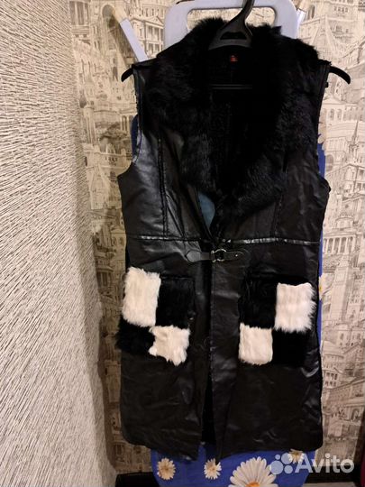 Меховая жилетка