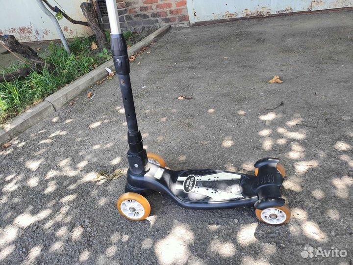 Четырех колесный самокат