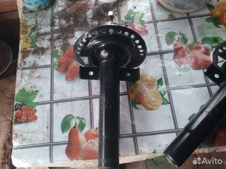 Передние стойки Рено Меган 2