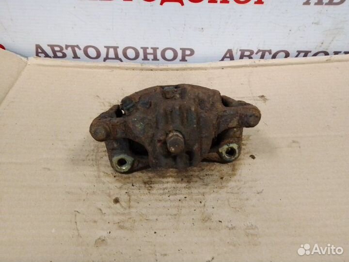 Суппорт тормозной передний левый Mitsubishi