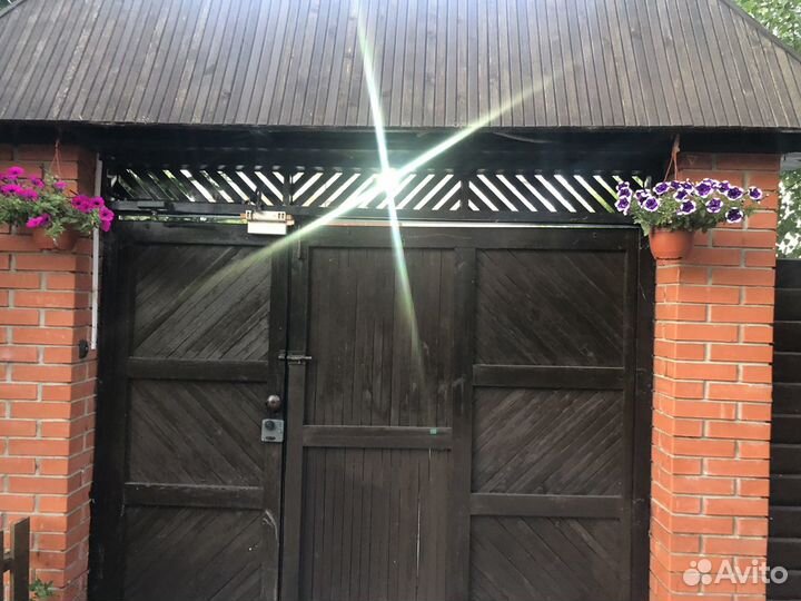 Секционные ворота с калиткой