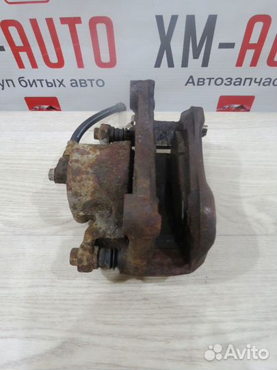 Суппорт передний правый Nissan Teana J32