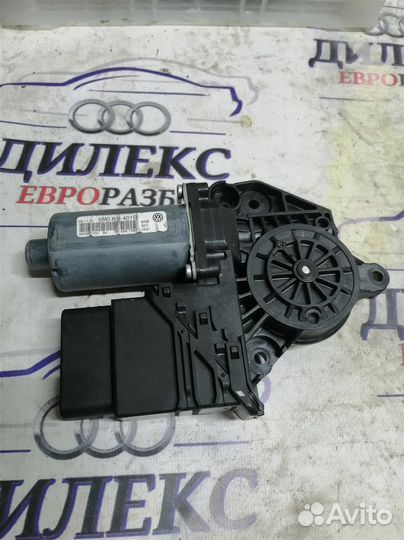 Моторчик стеклоподъемника задний левый VW Golf V