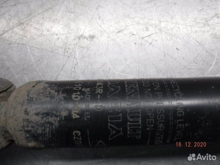 Амортизатор задний левый Nissan Terrano F4R 2014