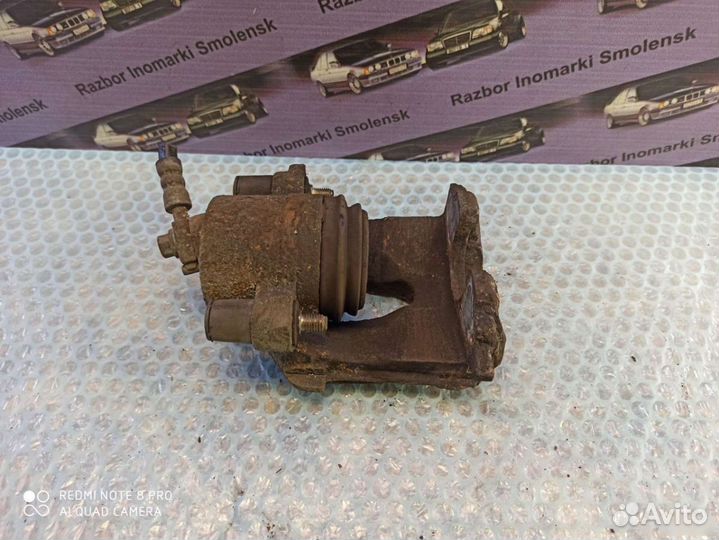 Супорт передний правый Volkswagen Polo 4