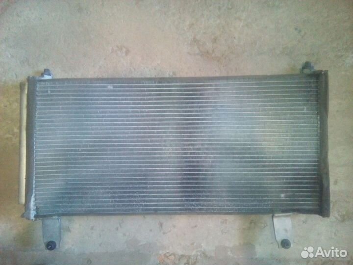 Радиатор кондиционера Suzuki Aerio RA21S