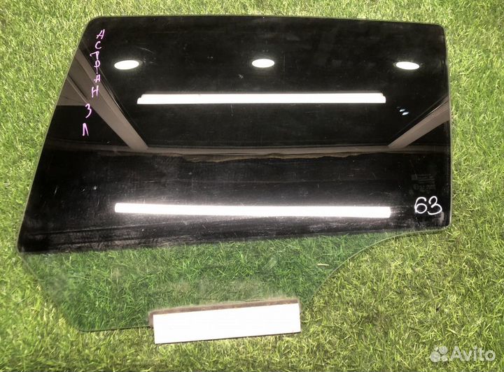 Стекло задней левой двери Opel Astra H