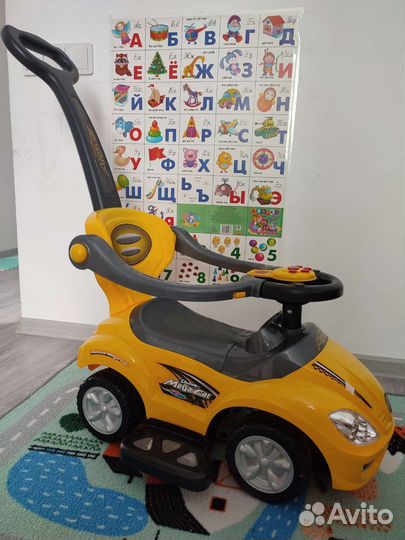 Детская машинка каталка с ручкой