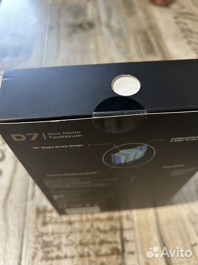 Электрическая зубная щетка