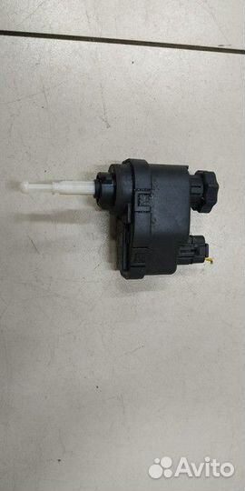 Моторчик корректора фары Opel Astra