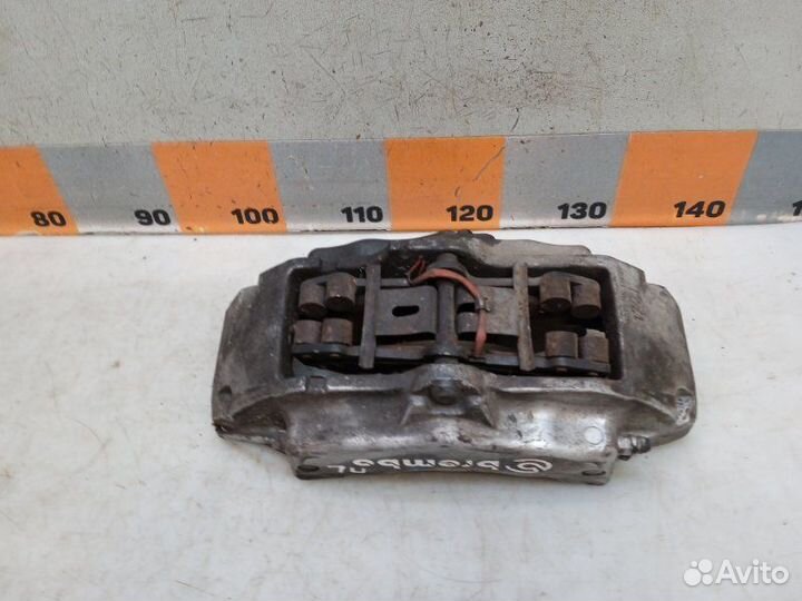 Суппорт передний левый Volkswagen Touareg