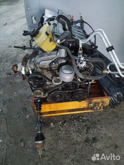 Двигатель с коробкой на мазду демио