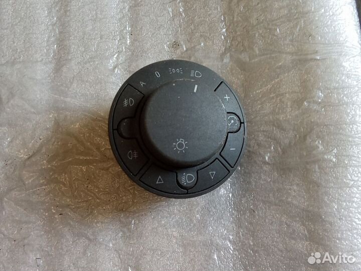 Opel Corsa D блок включения света