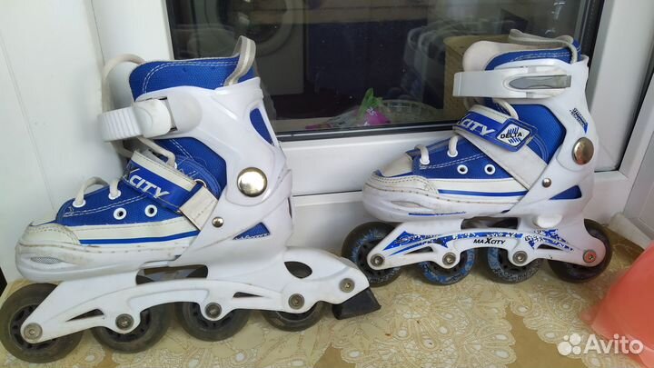 Роликовые коньки