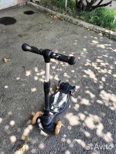 Четырех колесный самокат