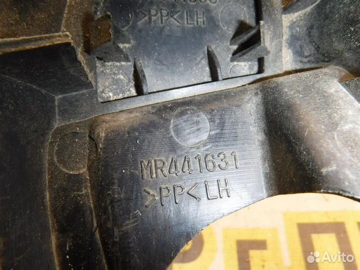 Крышка зеркала внутренняя левая Mitsubishi Lancer