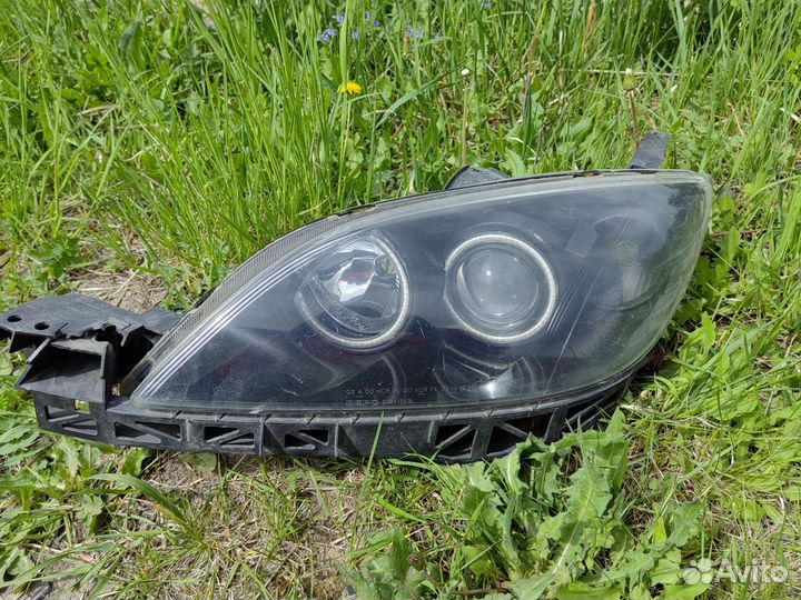 Фара передняя левая Mazda 3 bk хэтчбек