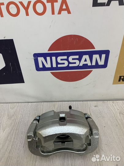 Суппорт тормозной перед Nissan almera classic B10