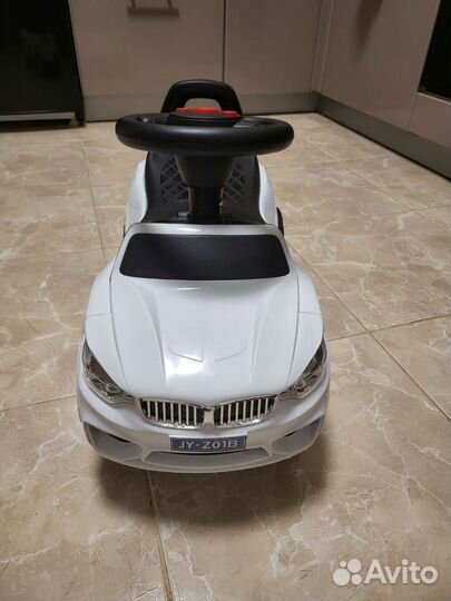 Машинка каталка толокар