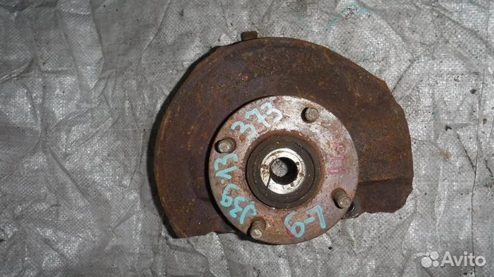 Кулак поворотный передний левый Mitsubishi Lancer