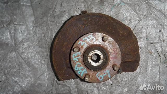 Кулак поворотный передний левый Mitsubishi Lancer