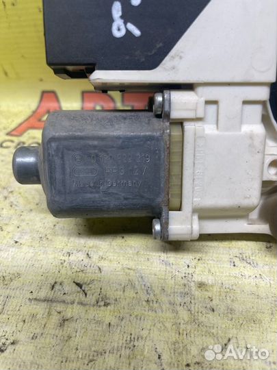 Мотор стеклоподъемника задний левый Ford Focus 2