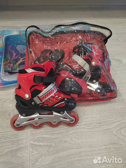 Роликовые коньки