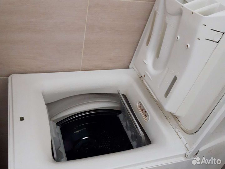 Стиральная машина с вертикальной загрузкой