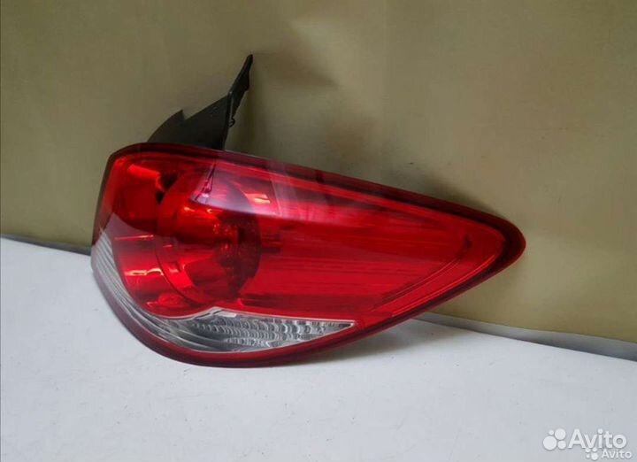 Продам L/P фонарь на chevrolet cruze хечбек