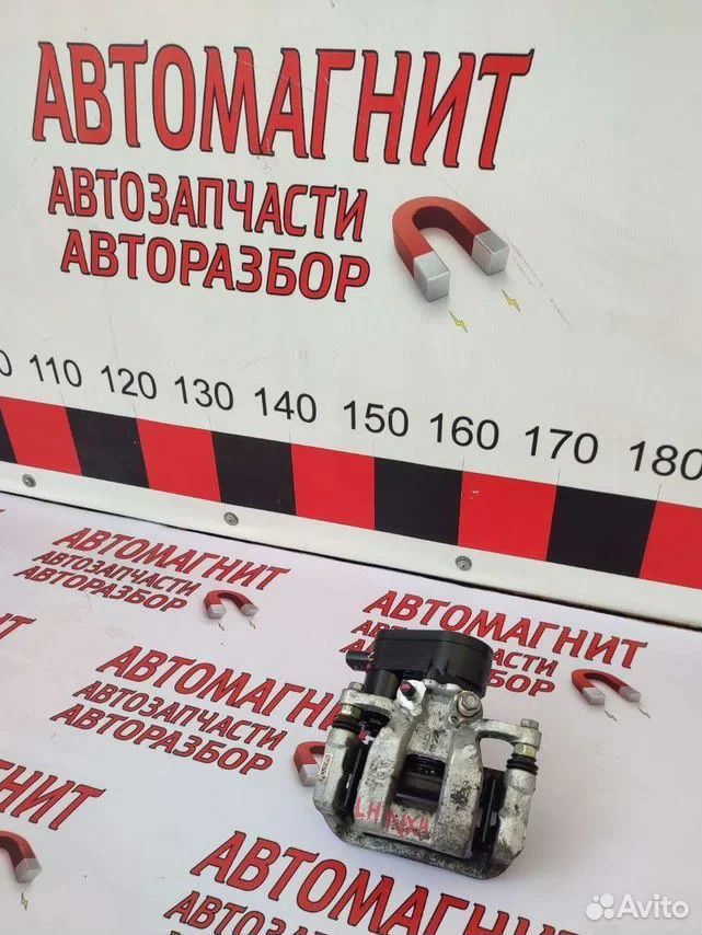 Супорт тормозной задний левый Хендай Туксон 4 NX