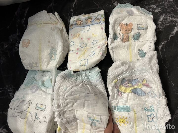 2 пакета памперсов