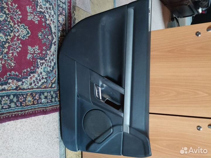 Обшивка водительской двери