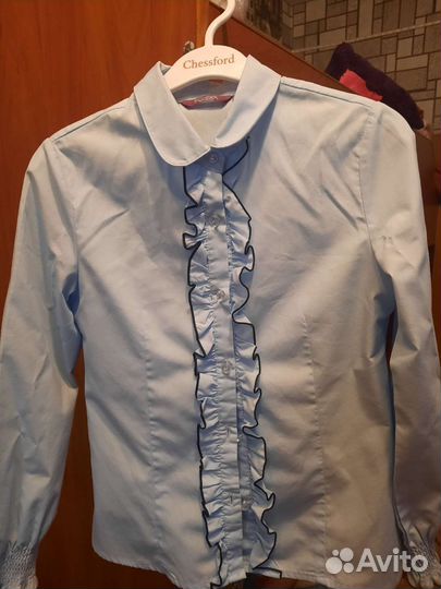 Блузка голубая