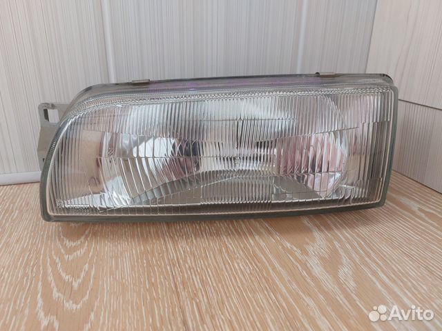Фара левая Mitsubishi Lancer / Mitsubishi Libero