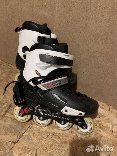 Роликовые коньки