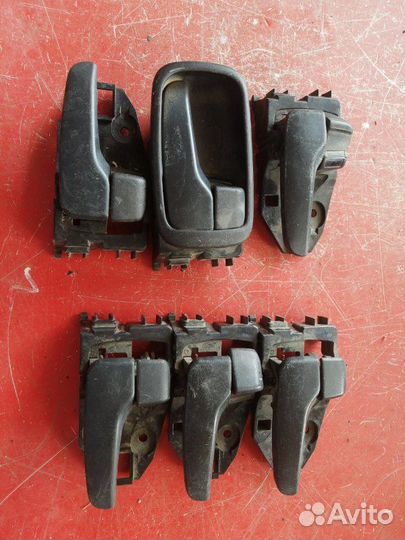 Ручка двери внутренняя левая Mitsubishi Lancer 9