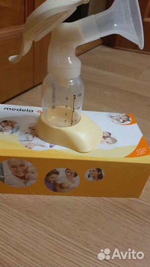 Молокоотсос medela ручной