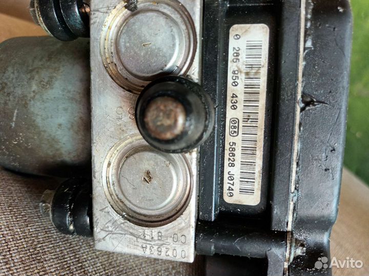 Блок абс Ауди а6с6