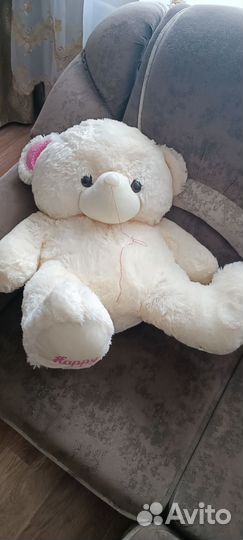 Большой плюшевый медведь